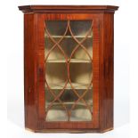 A Sheraton style mahogany and line inlaid corner cabinet, with astragal glazing,