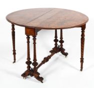 A Victorian walnut circular folding gateleg table, late 19th century,
