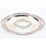 A sterling silver oval tray with pierced handles,