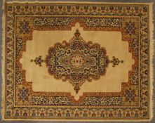 A large Oriental style machine woven wool rug