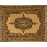 A large Oriental style machine woven wool rug