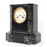 A late 19th century French marble and slate striking clock, with white dial and Roman numerals,
