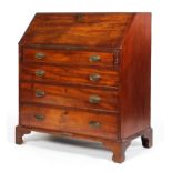 A George III mahogany bureau, the fall front lined with green baize,
