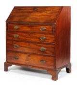 A George III mahogany bureau, the fall front lined with green baize,