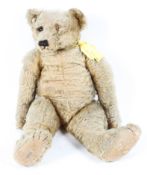 A large early 20th century plush teddy bear,