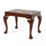 A Georgian style mahogany luggage stand, with slatted top, on cabriole legs, 43.