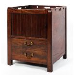 A Georgian mahogany tambour fronted pot cupboard, with pull out drawer and galleried top,