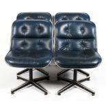 A set of four 1960's vintage Charles Pollock leather and chromed executive chairs in a dark blue