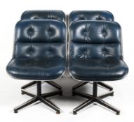 A set of four 1960's vintage Charles Pollock leather and chromed executive chairs in a dark blue