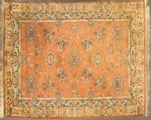 A machine woven oriental style rug