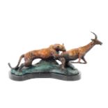 A patinated bronze group of cheetah hunting an antelope, 20th century,