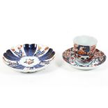 A Japanese imari pattern chocolate cup and saucer and a fluted imari pattern dish,