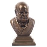 A bronze effect bust of Sir Winston Churchill by Victor Heyfron, on square plinth,