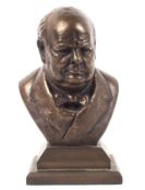 A bronze effect bust of Sir Winston Churchill by Victor Heyfron, on square plinth,