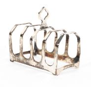 A sterling silver four slice toast rack by Edward Viner Sheffield 1936. 1.72ozt.
