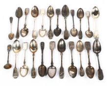 A large selection of assorted silver spoons, tea spoons and others,