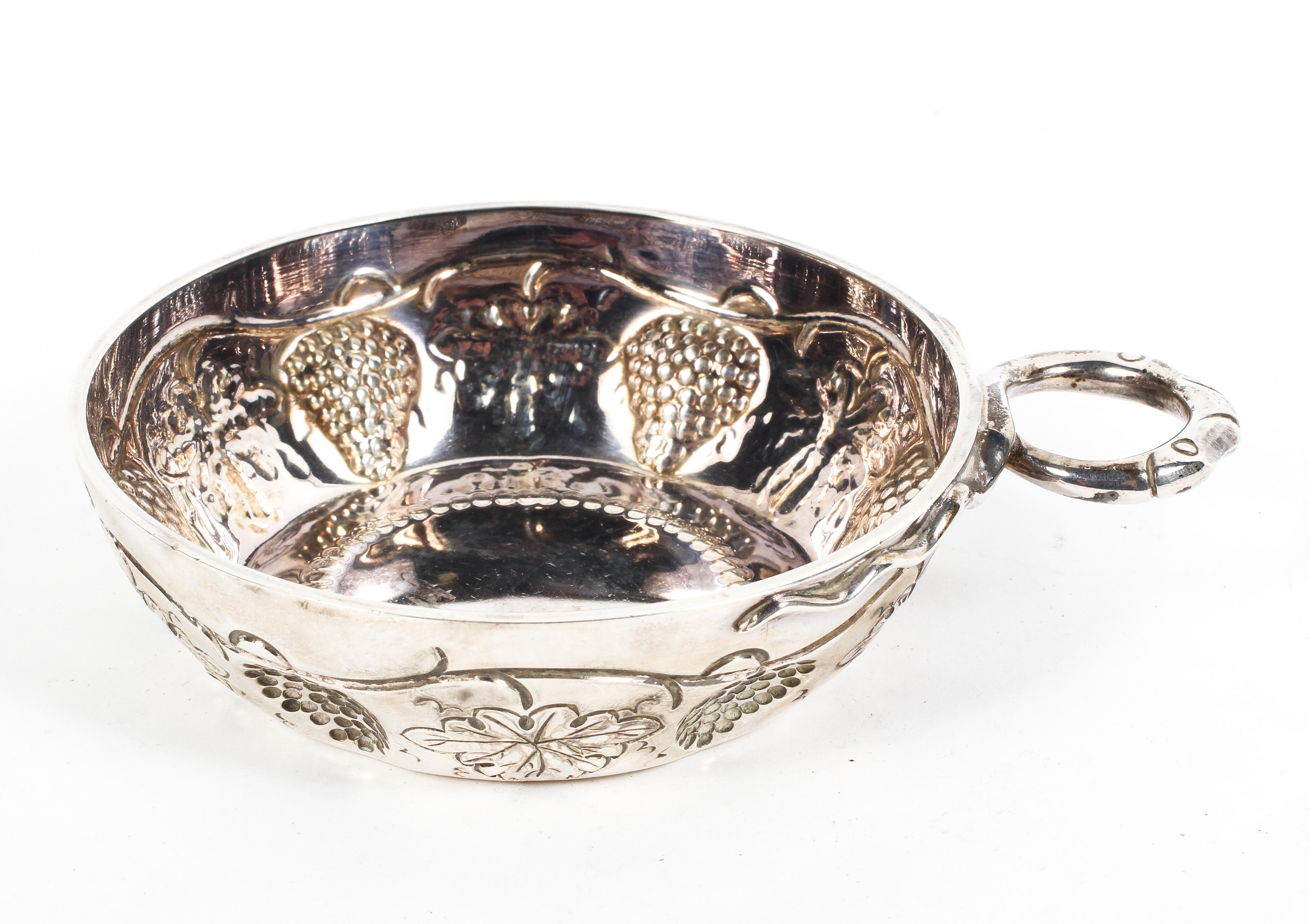 A sterling silver single handled Quaish with chased design by CJ Vander Ltd, London,1973, 4.