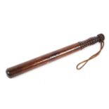 A turned wood military truncheon, early 20th century,