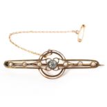 A 9ct gold 45.0mm length bar brooch principally set with a 4.