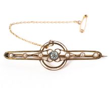 A 9ct gold 45.0mm length bar brooch principally set with a 4.