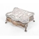 A small sterling silver jewellery casket on four ball and claw feet with velvet lined interior, 7.