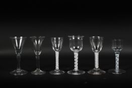 A collection of six English drinking glasses, circa 1770, including four opaque twist wine glasses,