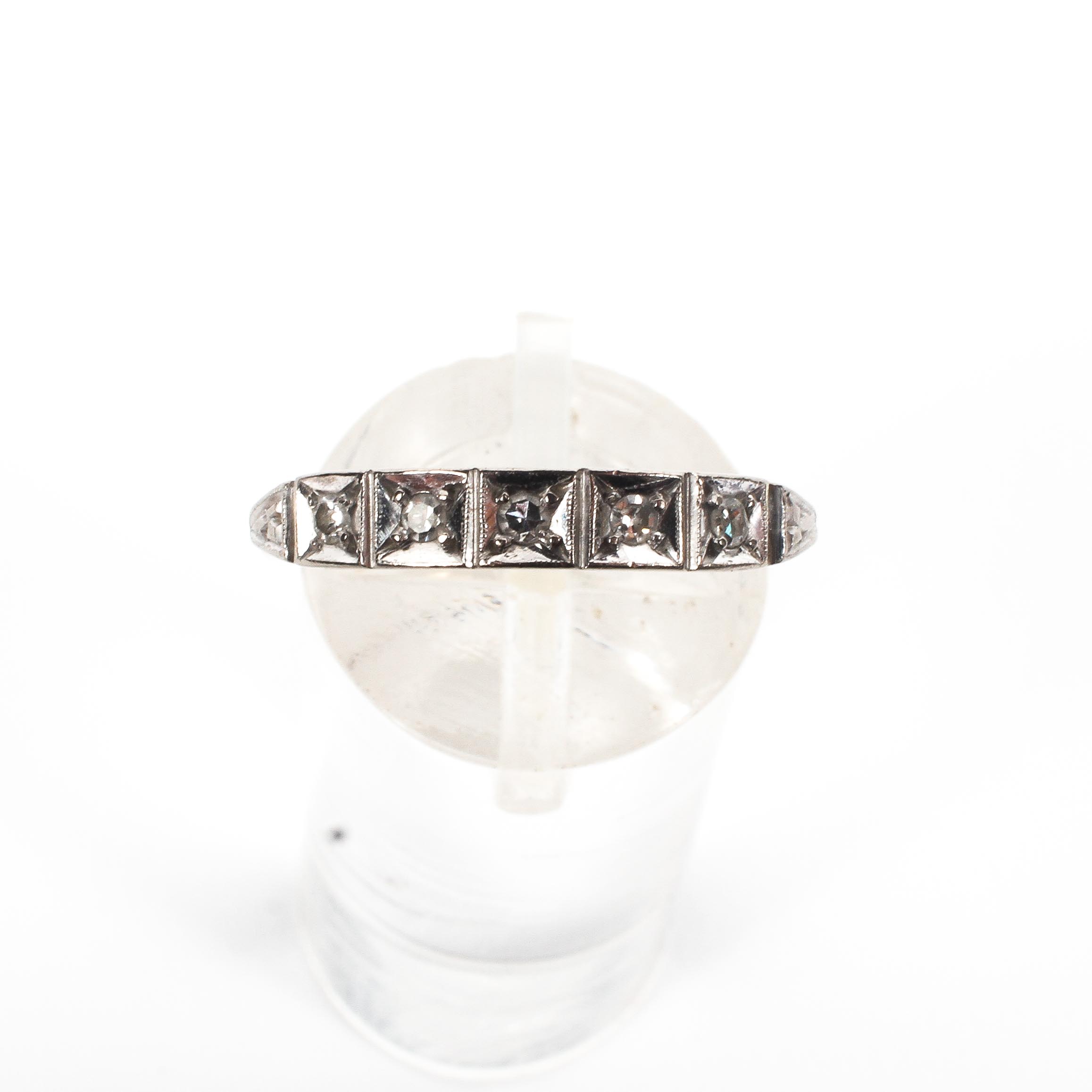 A yellow and white metal ring set with single cut diamonds estimated to weigh a total of 0.05cts. - Image 2 of 4