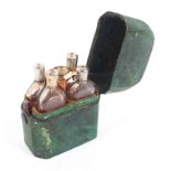 A travelling set of four scent bottles in shagreen case, 19th century,
