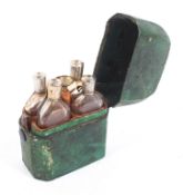 A travelling set of four scent bottles in shagreen case, 19th century,