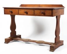 A late 19th century oak wash stand, with galleried top and three frieze drawers,