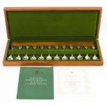 A Royal Horticultural society set of twelve limited edition silver and gold inlay flower spoons,
