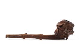 A Black Forest type carved wooden pipe, early 20th century,