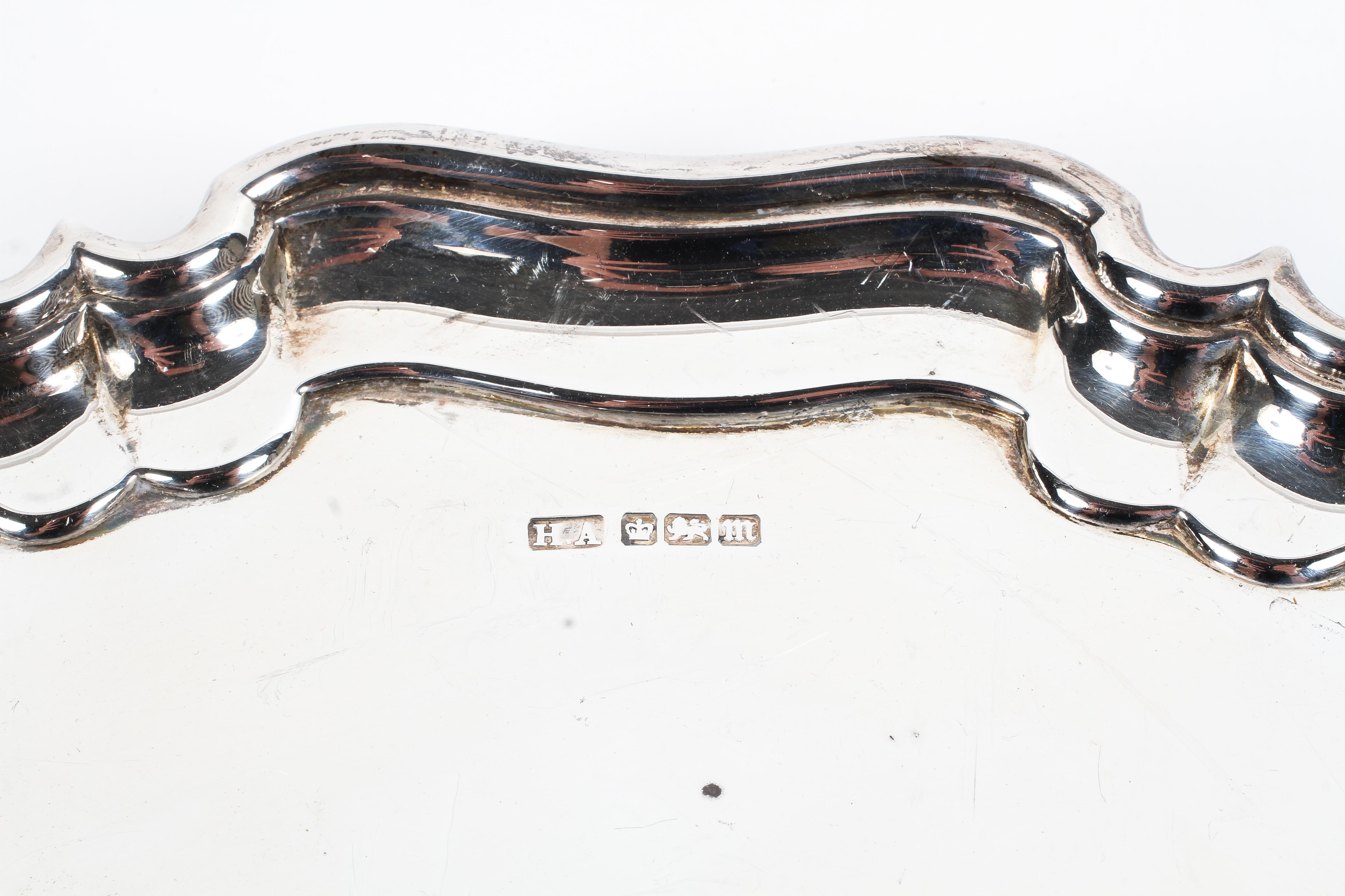 A sterling silver salver or card tray with pie crust border raised on three scrolling feet by Atkin - Image 2 of 2