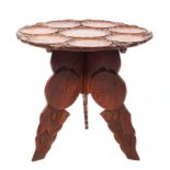 A carved wooden occasional table, 20thg century,