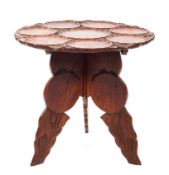 A carved wooden occasional table, 20thg century,