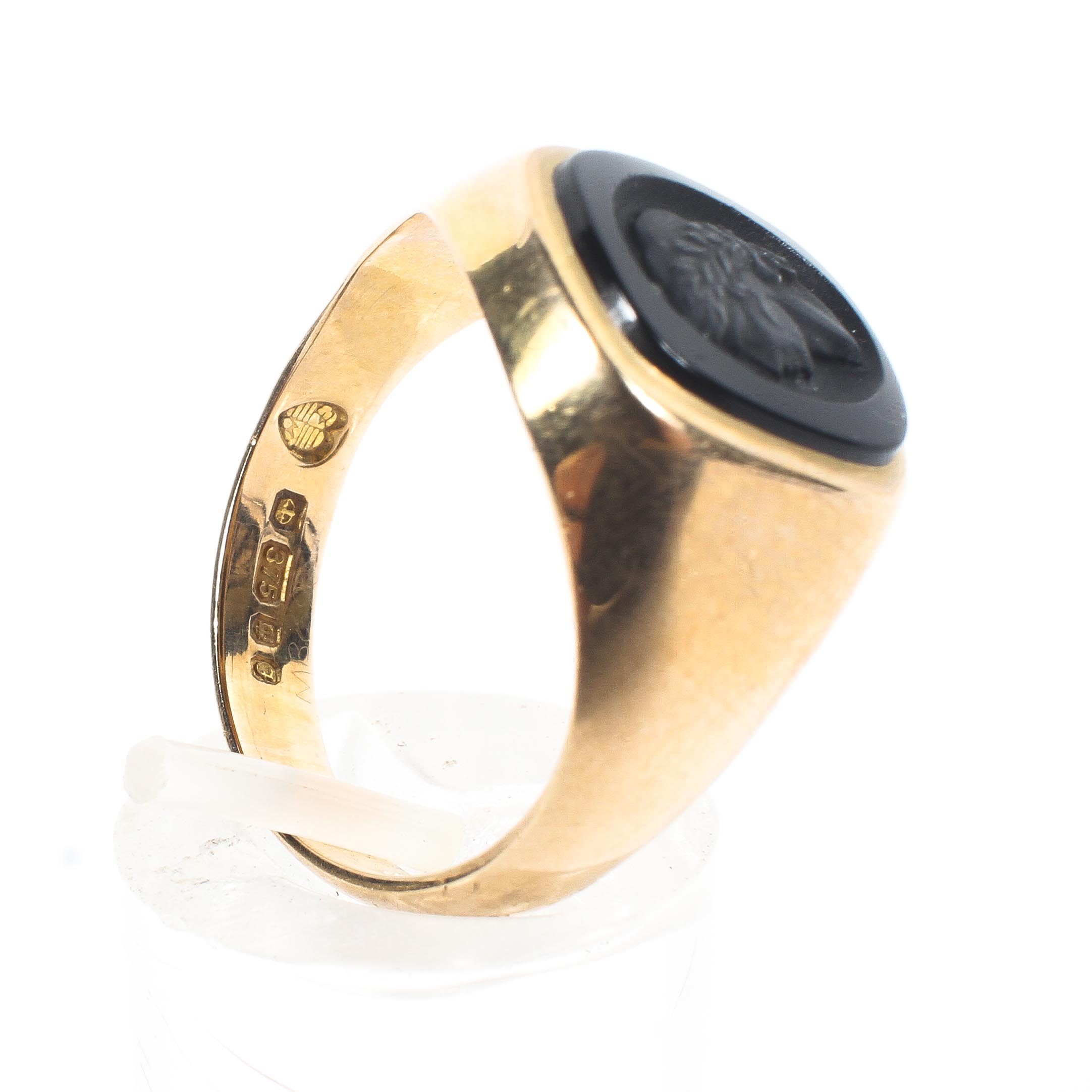 A yellow metal signet ring set with a cushion shaped embossed seal onyx. - Image 4 of 4
