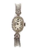 A vintage ladies 14ct white gold and diamond wristwatch,