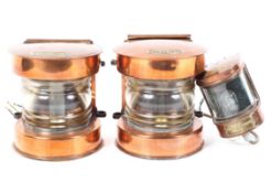 A pair of copper masthead lights, marked Meteor to the reverse,