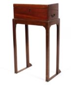 A 19th century mahogany boxed writing slope on stand, the interior fitted with tooled leather slope,