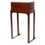 A 19th century mahogany boxed writing slope on stand, the interior fitted with tooled leather slope,