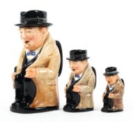 A set of three Royal Doulton Winston Churchill Toby jugs in sizes, mid-20th century,