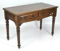 A late 19th century/early 20th century pine hall table, with two twin handled draws to front,