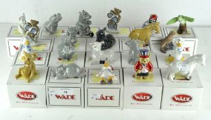 A collection of twenty one Wade ceramic figures, various designs and models,