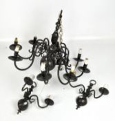 An eight branch moulded metal chandelier, painted in black, height 57cm,