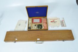 A wooden box of Lott's bricks, Lodomo Series, with plans and illustrations, with a toolbox