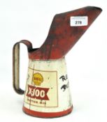 A Shell X-100 motor oil can,