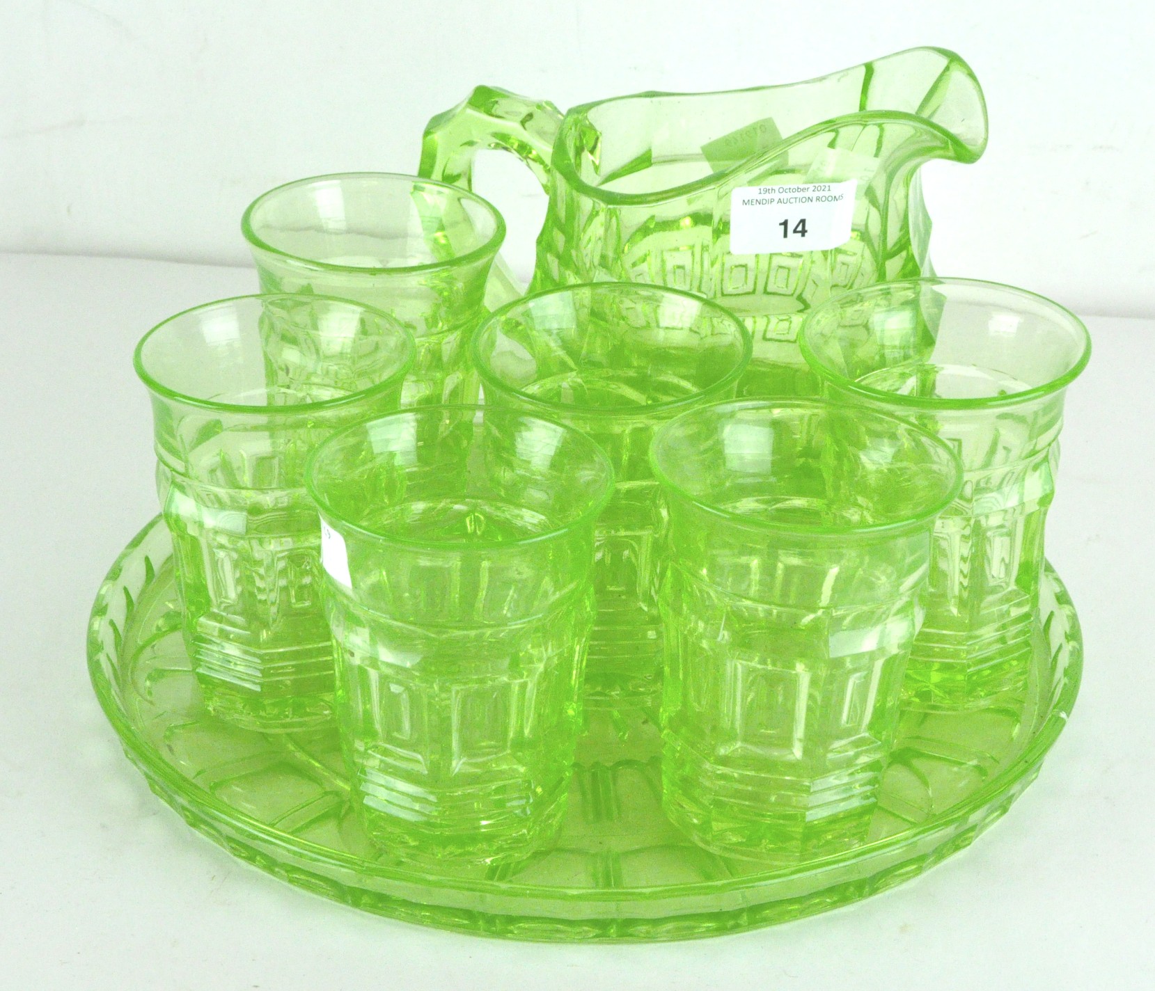 A six piece Uranium green glass lemonade set