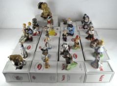 A collection of twenty nine Wade ceramic figures, various designs and models,