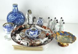 A collection of Asian and Chinese style ceramics, including two large Majolica dishes,