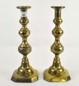 A pair of Victorian brass candlesticks, stamped Rd 195925,